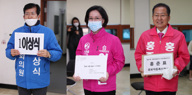 제21대 총선 후보자등록 신청 첫 날인 26일 대구 수성구선거관리위원회에서 수성을에 출마한 이상식(왼쪽부터) 더불어민주당 후보, 이인선 미래통합당 후보, 무소속 홍준표 후보가 접수 서류를 들고 포즈를 취하고 있다. 김영진 기자 kyjmaeil@imaeil.com
